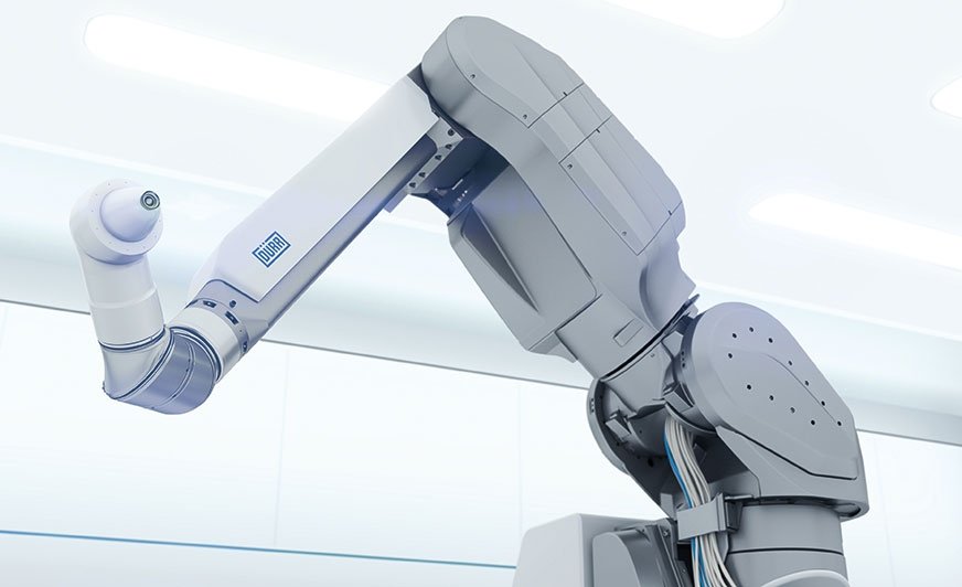 Zwiększona zwrotność siedmioosiowego robota EcoRP E043i oznacza, że nawet trudno dostępne miejsca na karoserii mogą być łatwo malowane